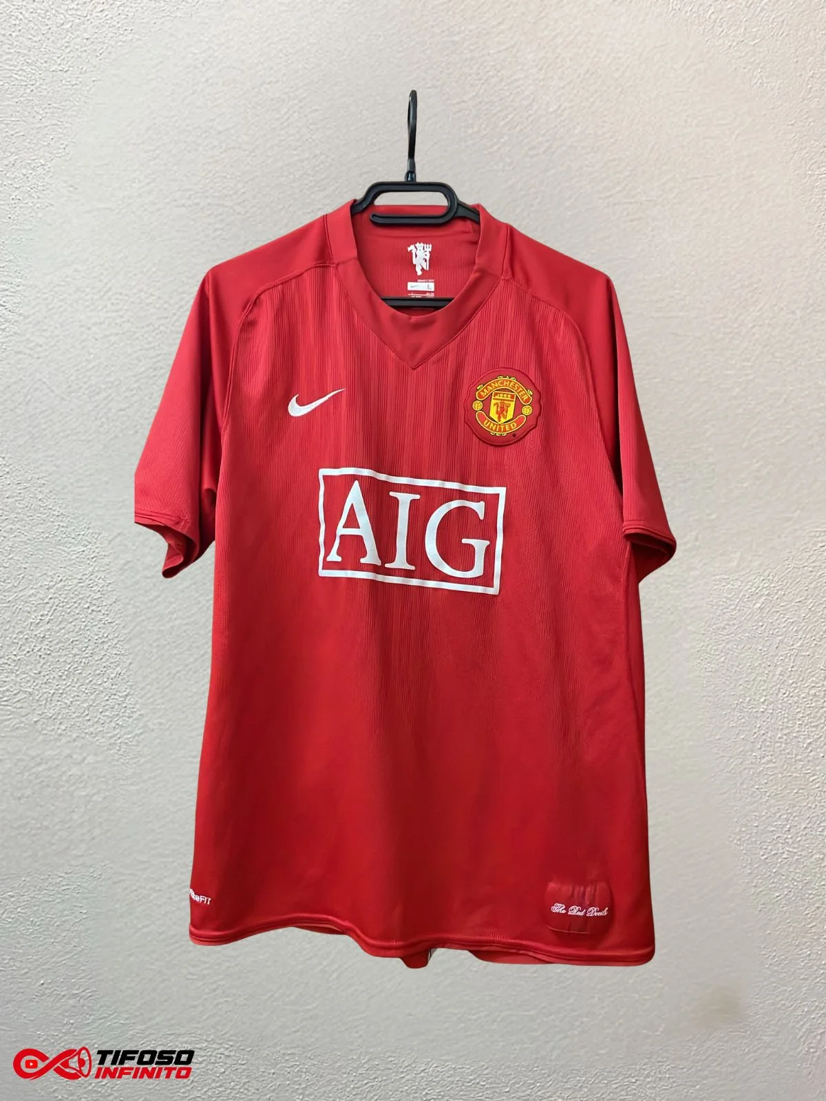 Fronte della maglia Manchester United Home 2007/08 Nike, sponsor AIG